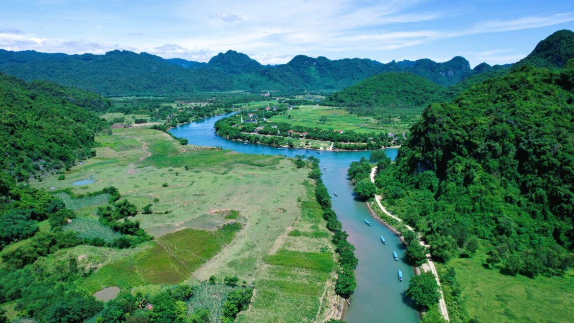 Aerial view of the Son River winding through lush landscapes in Phong Nha – Ke Bang National Park, Quang Tri province, Vietnam